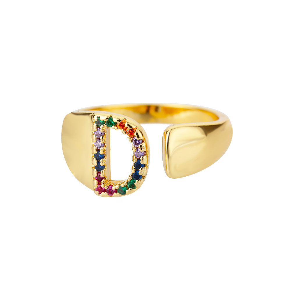 18K gold plated micro pave zircon letter ring with colorful stones, open design featuring a single letter in elegant jewelry style.