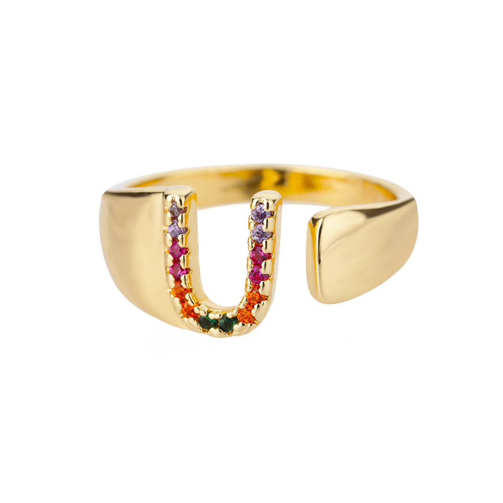 18K gold plated micro pave zircon letter ring featuring colorful stones and open design, showcasing alphabet lettering.