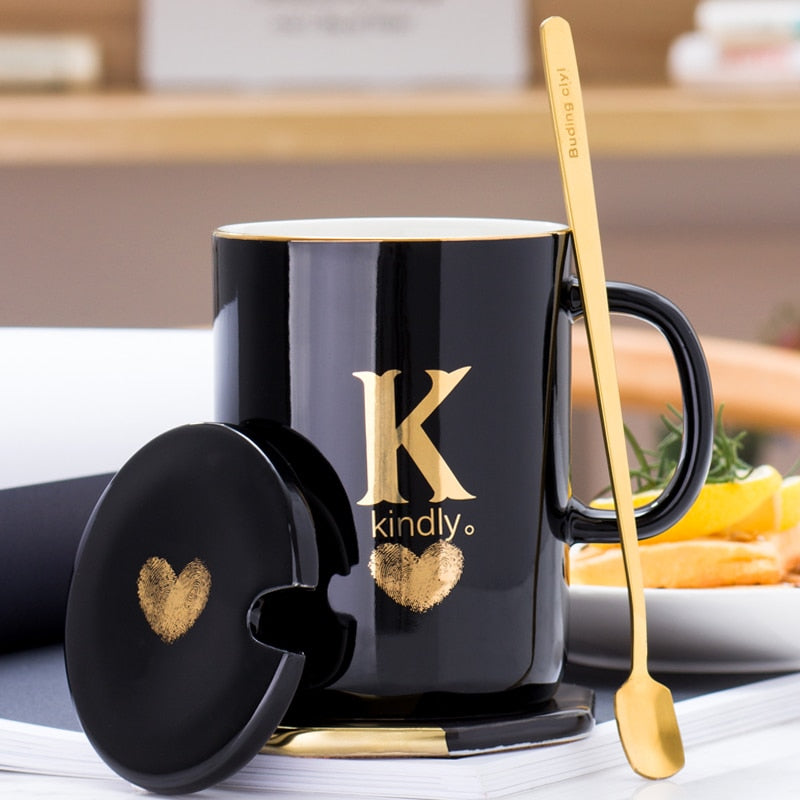 Creative 400ml black ceramic coffee mug with gold handle, lid, and spoon, ideal for gift, featuring gold finger printing design.