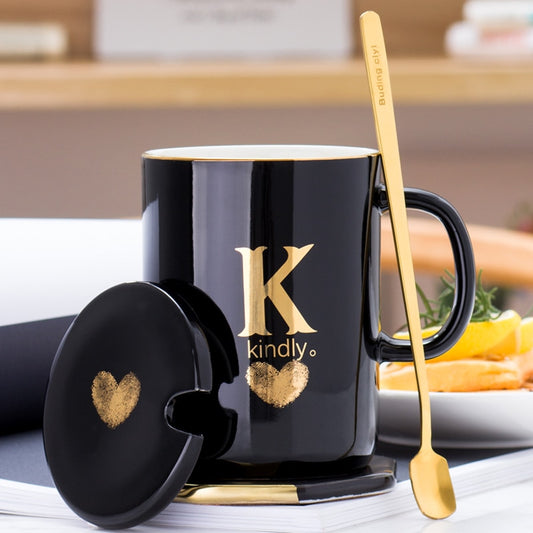 Creative 400ml black ceramic coffee mug with gold handle, lid, and spoon, ideal for gift, featuring gold finger printing design.
