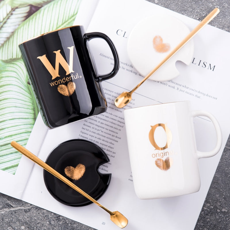 Eprolo 400ml black ceramic coffee mug with gold handle, lid, and spoon, featuring a creative gold fingerprint design.