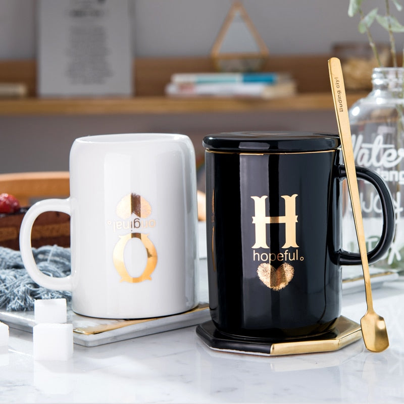 Eprolo 400ml black ceramic coffee mug with gold handle, lid, and spoon, featuring a creative gold finger printing design.