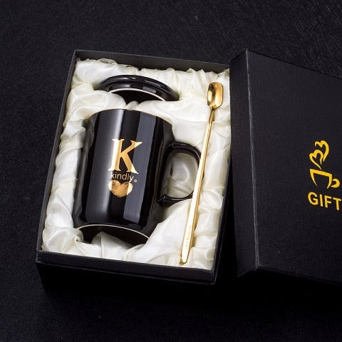 Eprolo 400ml black ceramic coffee mug with gold finger printing, gold handle, lid, and spoon for tea or coffee.