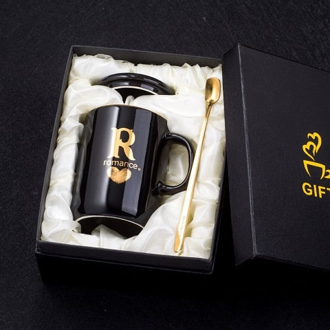Black ceramic coffee mug with gold handle and lid, 400ml capacity, featuring a creative gold finger printing design, by eprolo.