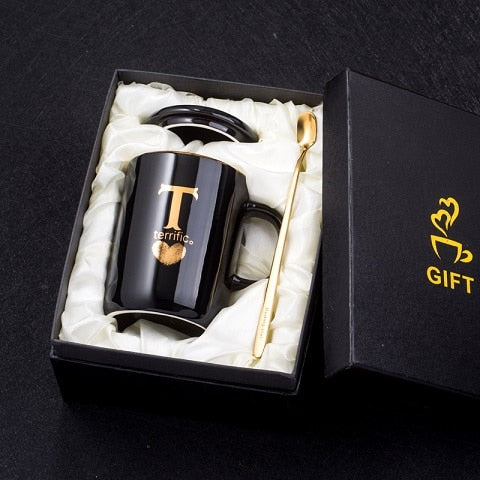 Black ceramic coffee mug with gold handle, lid, and spoon, 400ml creative gold finger printing design, ideal for tea or coffee.