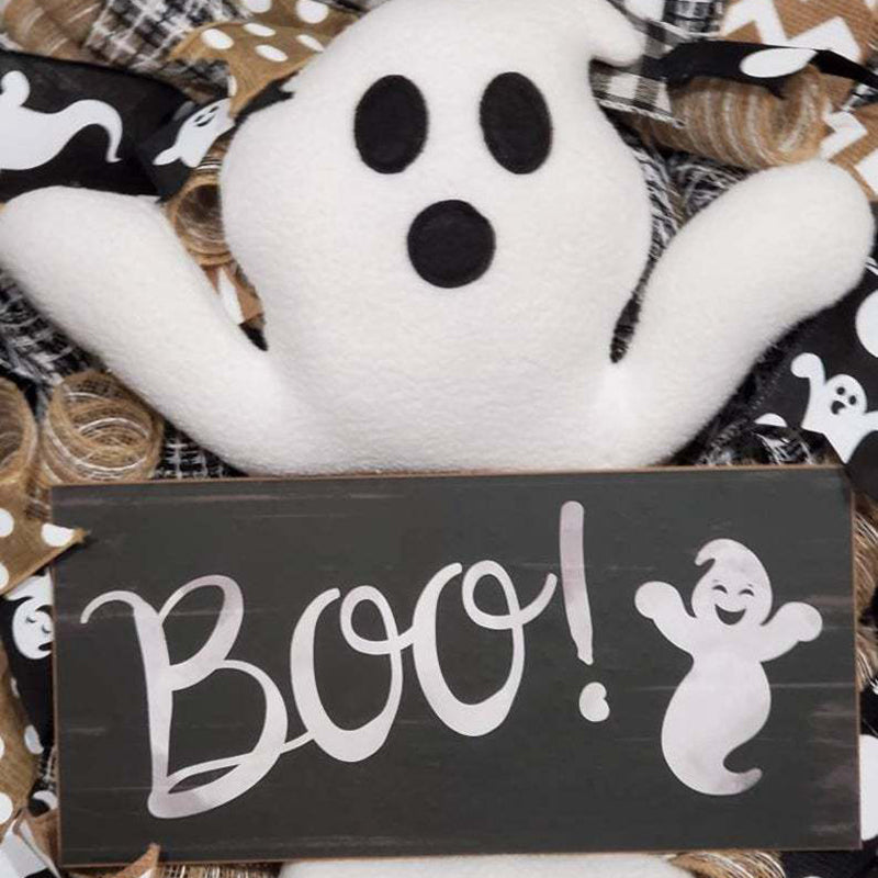 Cute Halloween ghost wreath hanging on door, featuring a boo ghost design, for festive door and window Halloween decorations.