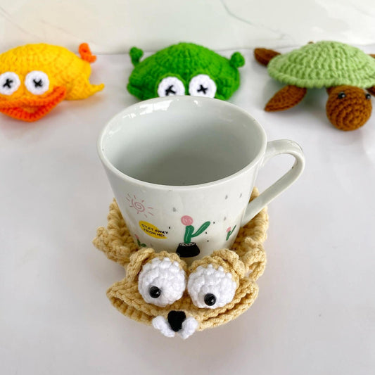Handmade crochet animal coasters featuring a turtle and squirrel, heat-insulating pads for creative desk or home decor.