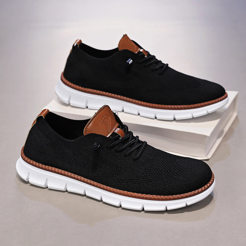 Men's trendy work sneakers by eprolo, showcasing black and gray athletic shoes with breathable fabric and sturdy soles.
