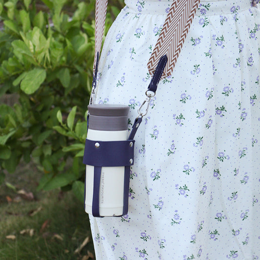 Eprolo outdoor insulated stainless steel bottle with detachable woven shoulder strap and diagonal cup cover.