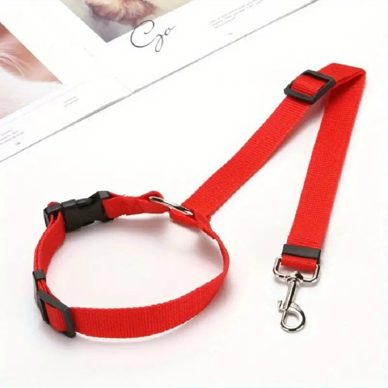 Adjustable pet car safety belt with ring and harness for dogs, ensuring secure travel in the rear seat.