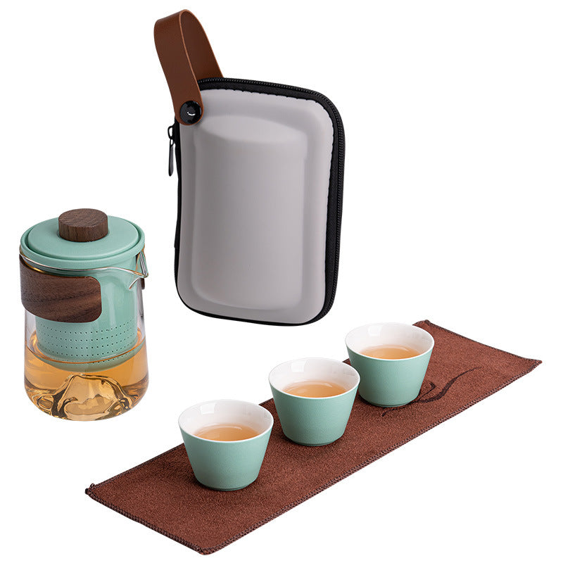 Eprolo portable travel tea set with small cups and brewing accessories, ideal for outdoor use and quick tea brewing.
