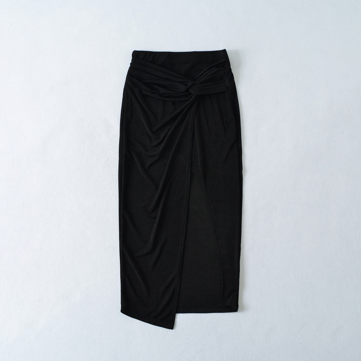 High waisted split long skirt by eprolo featuring a leg-revealing slit and flowing fabric.