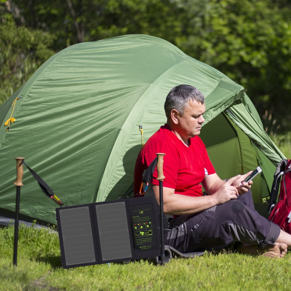 Eprolo 10W 5V portable solar panel charger for phones, outdoors, with two flexible solar panels for hiking and outdoor use.