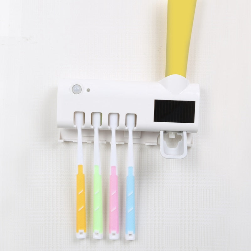 Eprolo wall toothbrush holder with automatic toothpaste squeezer and disinfectant for bathroom and toilet organization.