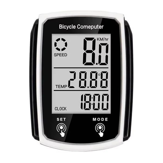 Wired LCD bicycle computer with backlight displaying speed and odometer readings on a bike handlebar.