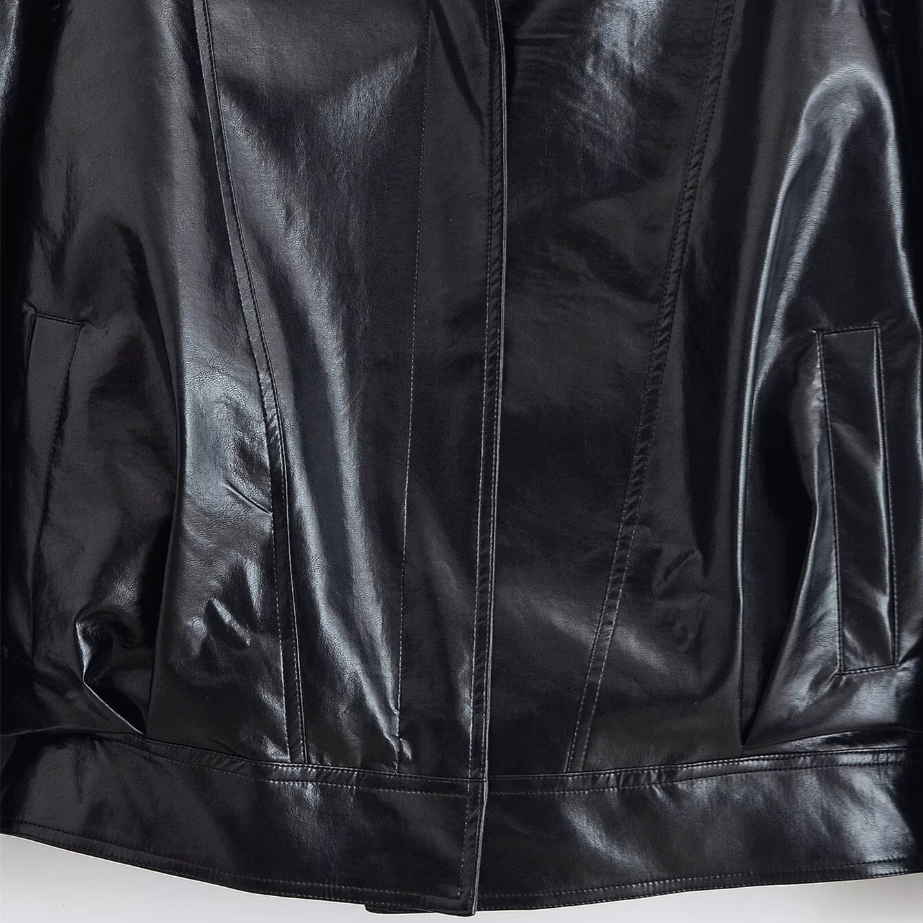 Eprolo women's retro cool leather jacket displayed on a hanger, featuring classic design and stylish details.
