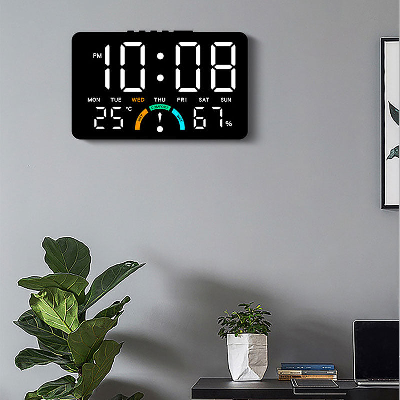 eprolo digital alarm clock showing time, temperature, humidity, with dual alarms and snooze button on a bedside table