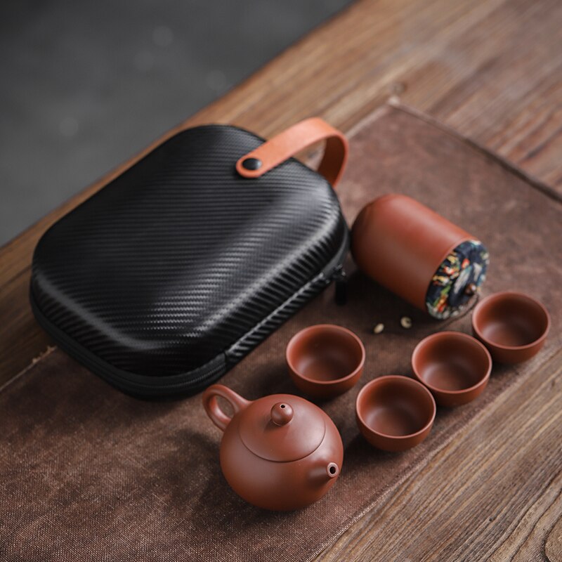 Purple ceramic tea cups and portable teapot set for outdoor travel, perfect for Kung Fu tea ceremonies and gift-giving.