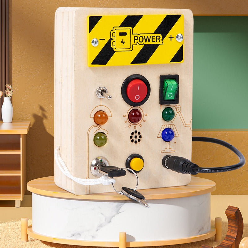 Wooden Montessori busy board for kids with LED light switch, sensory toys, and travel activities for children aged 2-4 years.