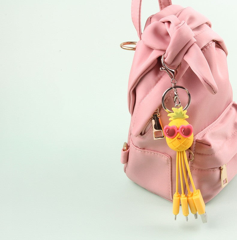 Creative cartoon eprolo data cable featuring a quirky peach blossom eye and pineapple fruit design for phone charging.