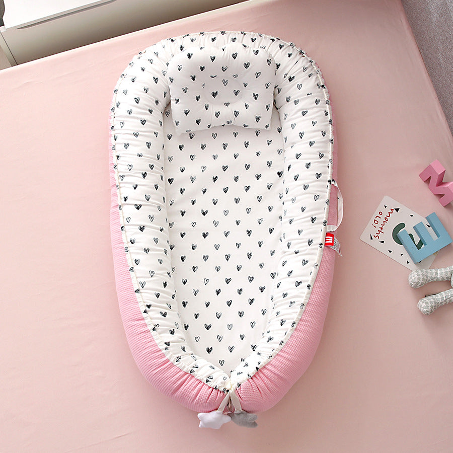 Portable baby crib with removable washable pillow by eprolo, designed for travel and easy to clean.