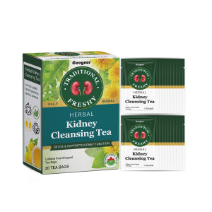 Herbal kidney detox cleansing tea in a clear glass cup, featuring dried herbs and tea leaves, promoting kidney health and cleansing.