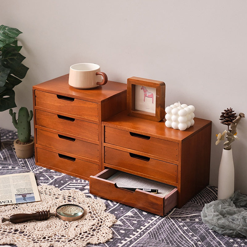 Small wooden three-layer storage cabinet with cosmetic organizer and display screen riser by eprolo, showing multiple compartments.