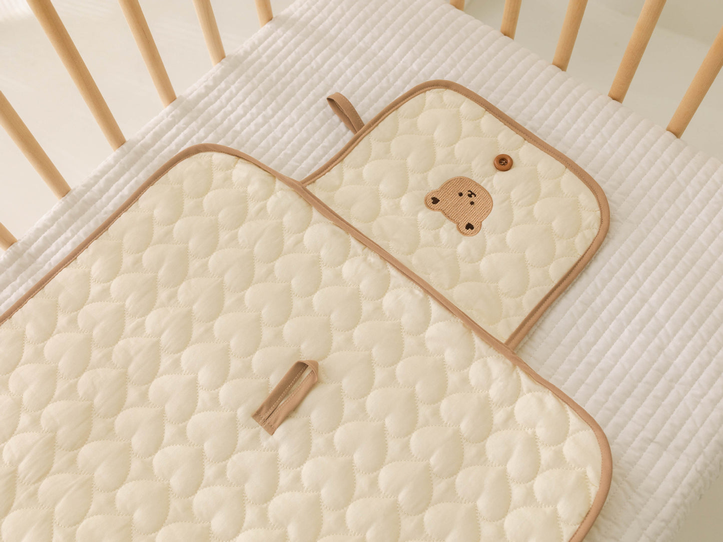 Eprolo baby portable diaper pad bag with cute embroidery, urine protection, no hood, compact changing pad for on-the-go use.