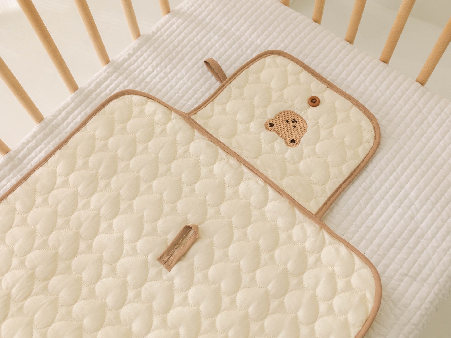 Eprolo baby portable diaper pad bag with cute embroidery, urine protection, no hood, compact changing pad for on-the-go use.