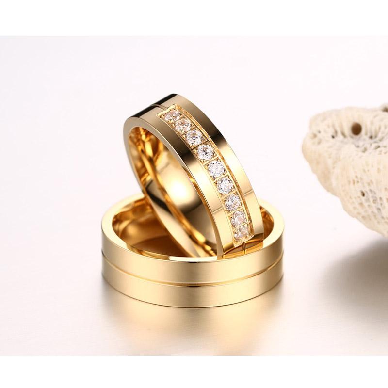 Elegant Vnox wedding bands for women and men by eprolo, featuring polished promise rings with a sleek, modern design.