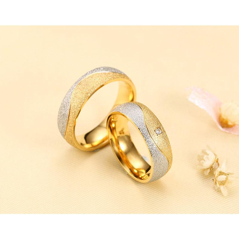 Sand blasted Vnox couple engagement rings for women and men, featuring a modern, stylish design with a matte finish.