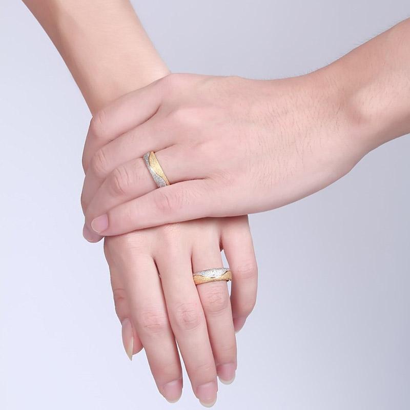 Vnox couple engagement rings for women and men with sandblasted finish, featuring sleek silver bands with modern design.