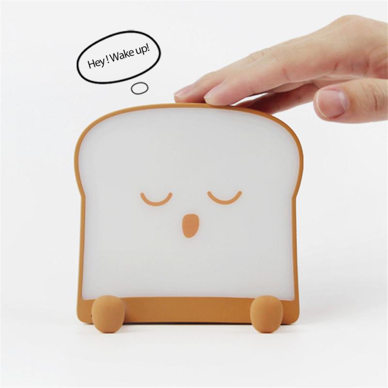 Eprolo toast bread night light with USB charging, square-shaped bedside lamp emitting soft light, featuring a single-sided light design.