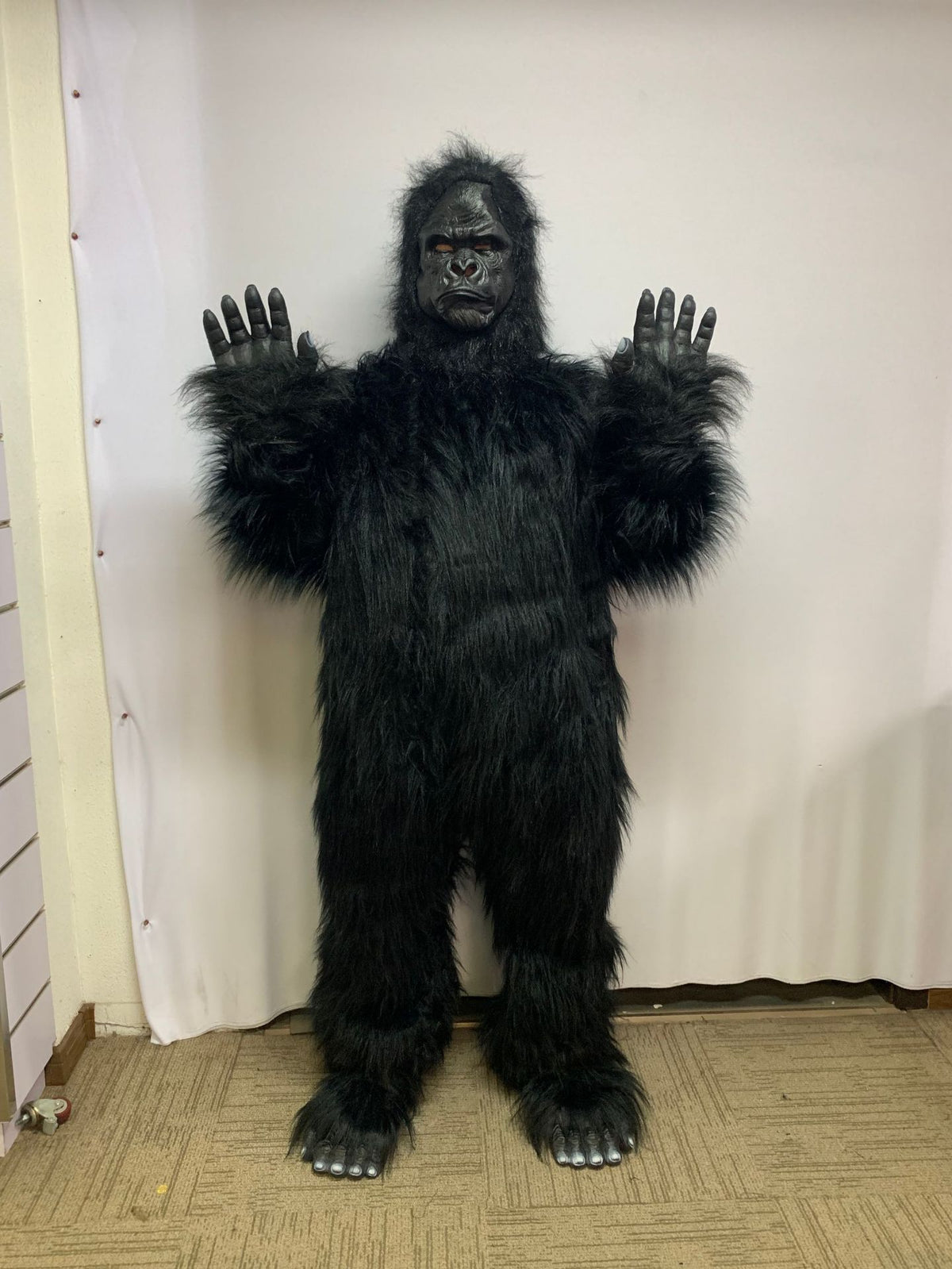 Godzilla and King Kong full-body Halloween costumes by eprolo, featuring detailed monster suits for parties and events.
