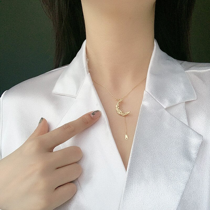 Vintage moon necklace featuring a silver crescent moon pendant on a delicate chain, crafted by eprolo.