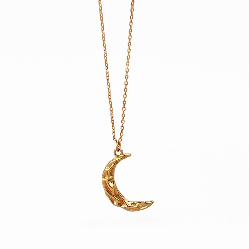 Vintage Moon Necklace by eprolo featuring a detailed crescent moon pendant on a delicate chain.
