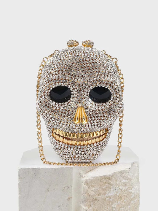 Diamond Halloween skull clutch bag for women with rhinestones, crystal chain, gold or silver finish, perfect for evening or wedding.
