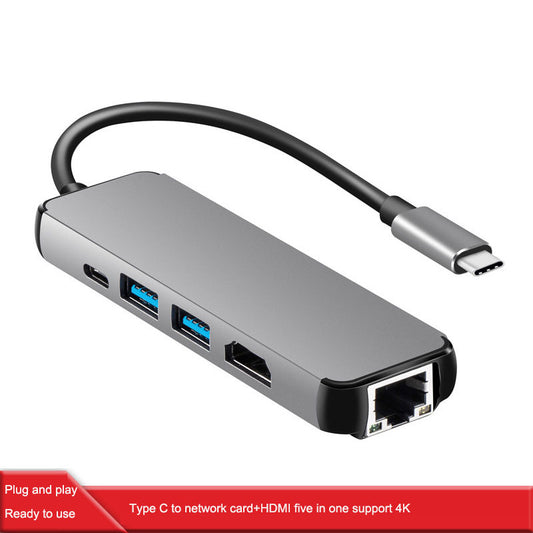 eprolo Type C docking station with HDMI 4K, Gigabit Ethernet, and USB 3.0 hub connected to a laptop.