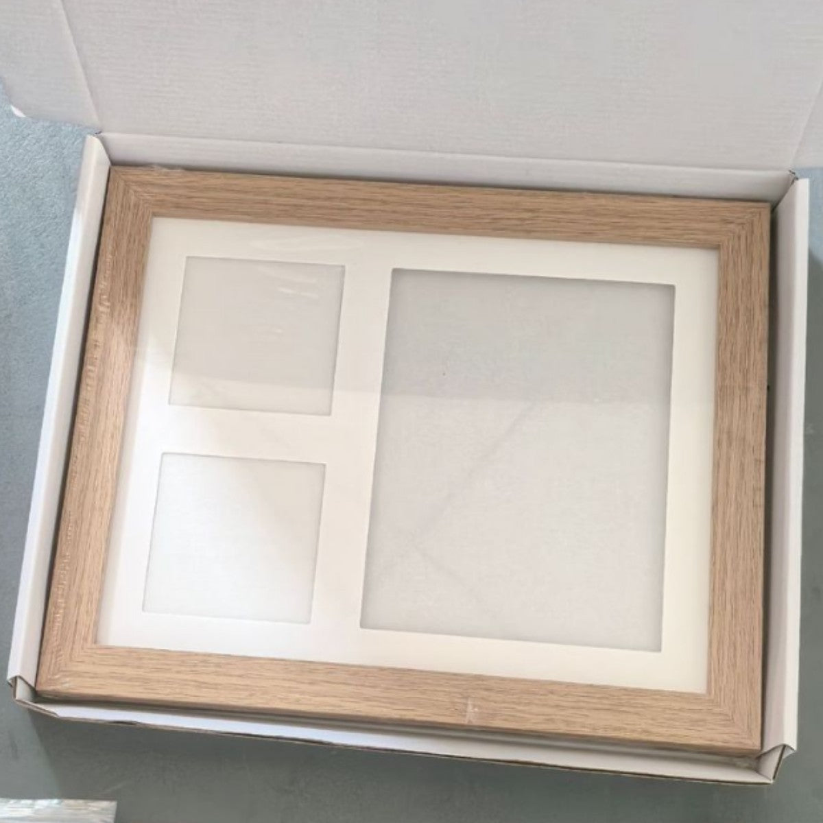 Eprolo handprint and footprint frame with ink pad, featuring baby, dog, and cat paw prints in a DIY child photo keepsake frame.