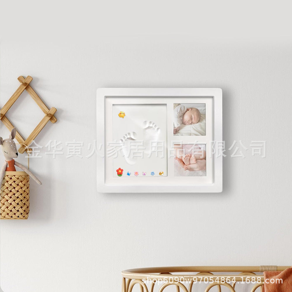 Eprolo baby keepsake frame with handprint, footprint, and paw print ink pads for DIY child and pet photo display.
