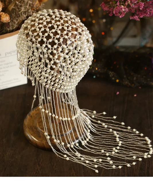 Handmade hollowed headpiece with pearl tassels, performance hat by eprolo, featuring intricate design and decorative embellishments.