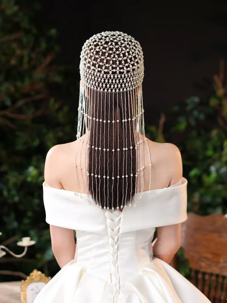 Handmade hollowed-out headpiece with pearl tassels, performance costume hat by eprolo, featuring intricate design and elegant details.
