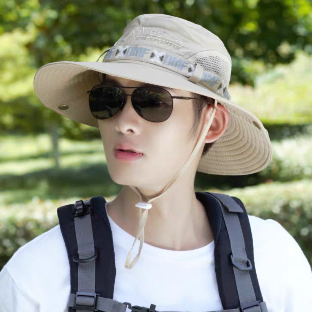 Men's outdoor bucket hat with wide brim for sun protection, suitable for fishing, beach, and hiking activities.