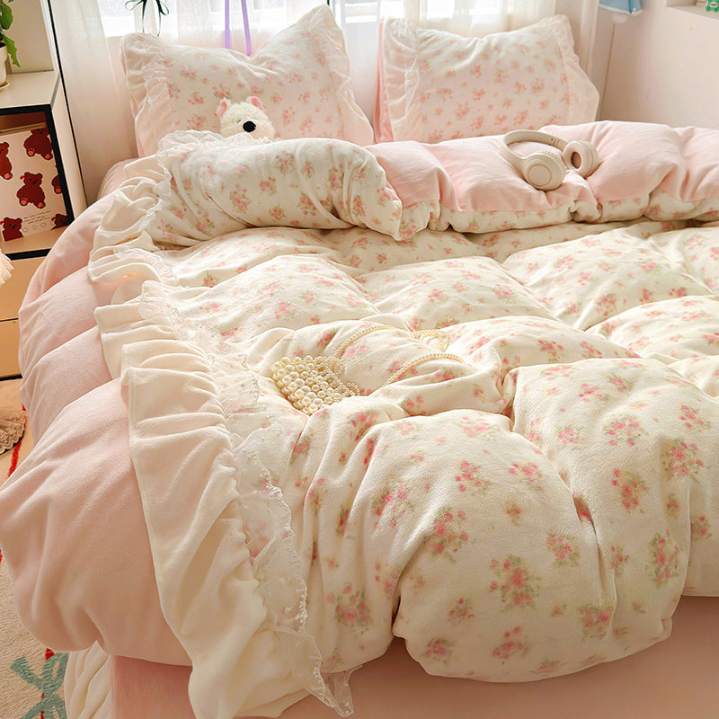 Eprolo princess style milk velvet bed four-piece set with thick double-sided velvet duvet cover and matching bed sheet on a bed.