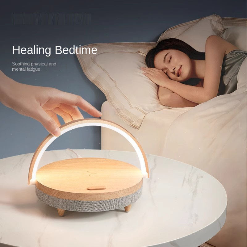 Eprolo living desk lamp with wireless charging, Bluetooth speaker, and minimalist design, perfect for bedside or workspace.