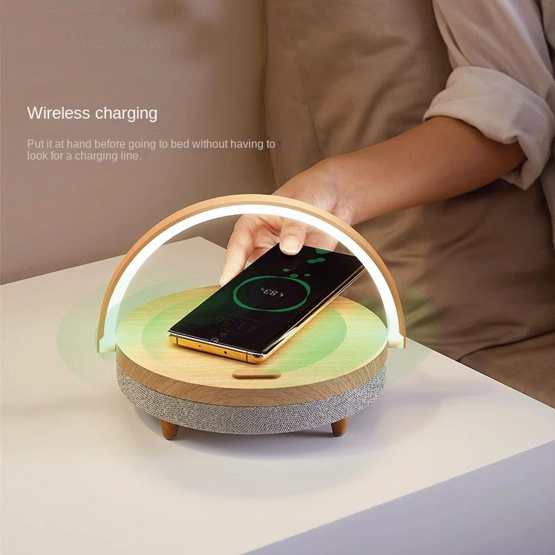 Eprolo living desk lamp with wireless phone charger and Bluetooth speaker, minimalist bedside lamp with modern design.