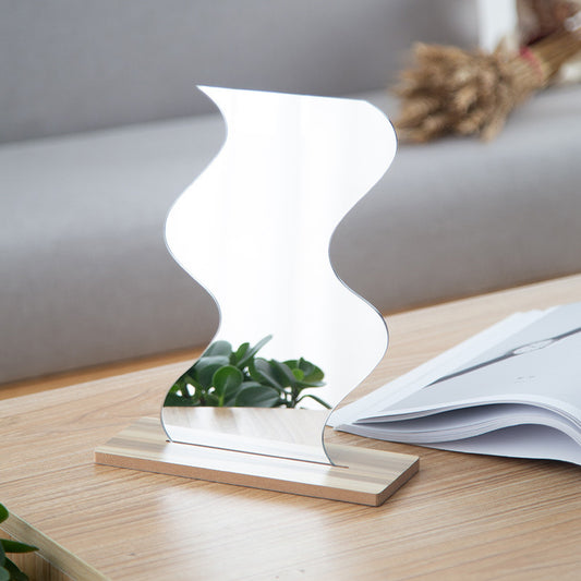 Irregular acrylic vanity mirror for women, photo props or desk makeup mirror, featuring a modern, artistic design.