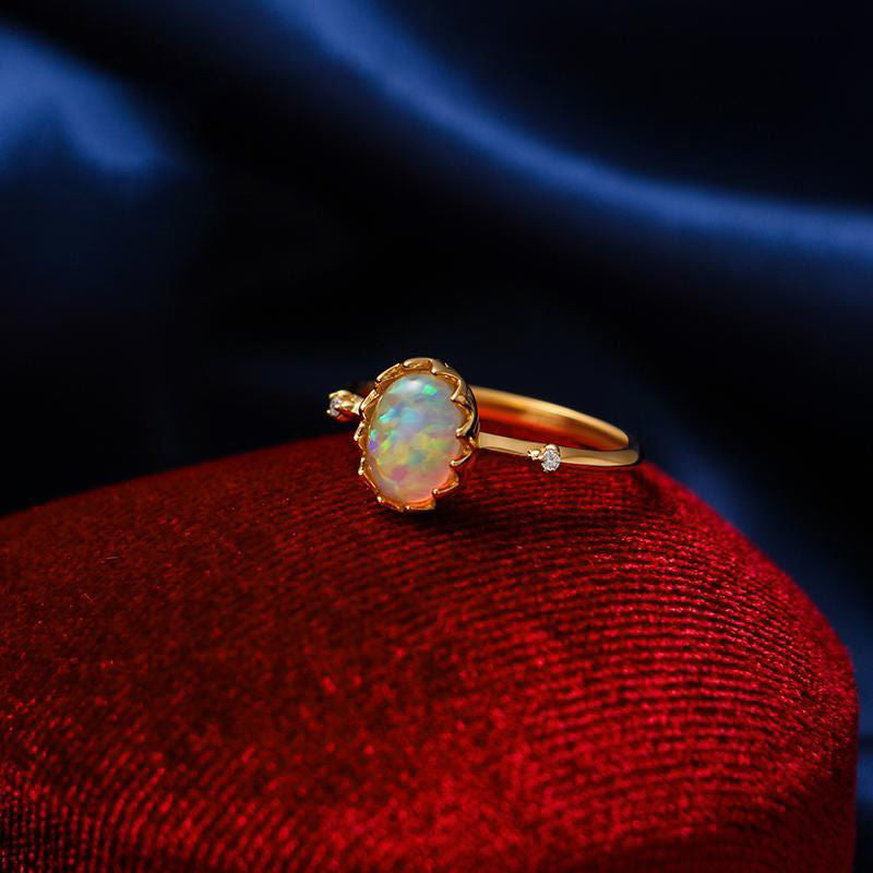 Gold-plated retro imitation opal ring for women, stylish jewelry featuring vibrant opal-like stone and vintage-inspired design.