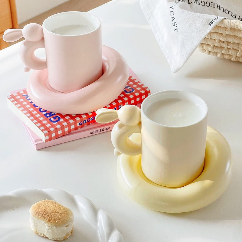 Eprolo rabbit ceramic coffee cup with matching saucer, featuring a stylish design for afternoon tea and high-value mug presentation.