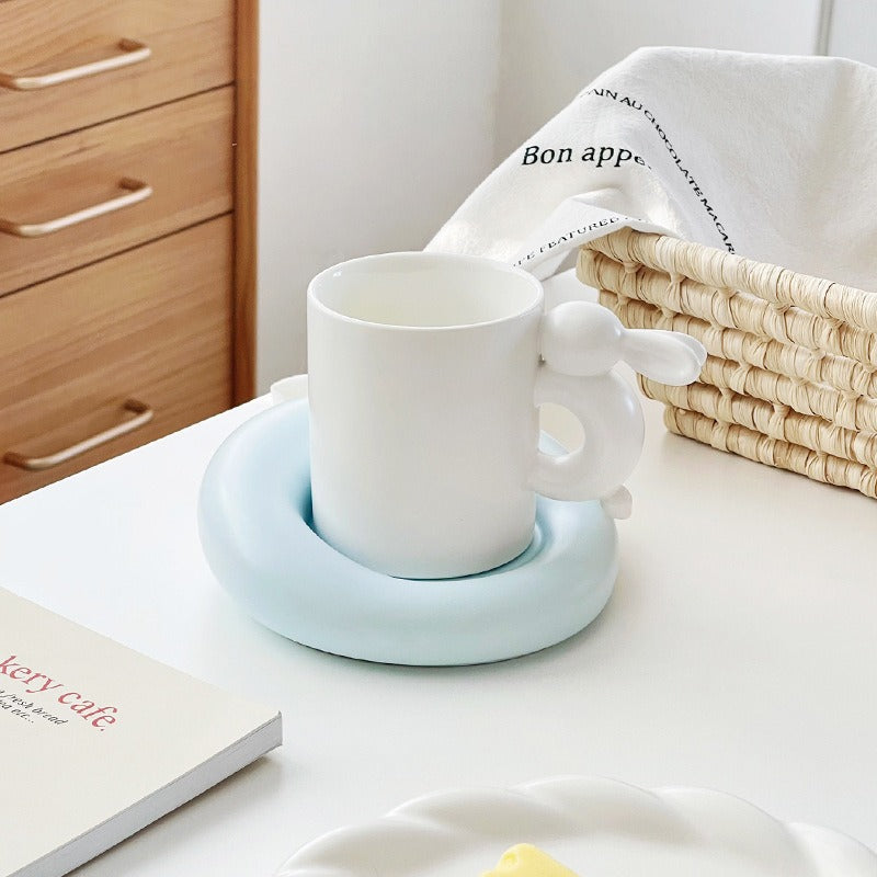 Eprolo rabbit-themed ceramic coffee cup with matching saucer set, ideal for afternoon tea and stylish table settings